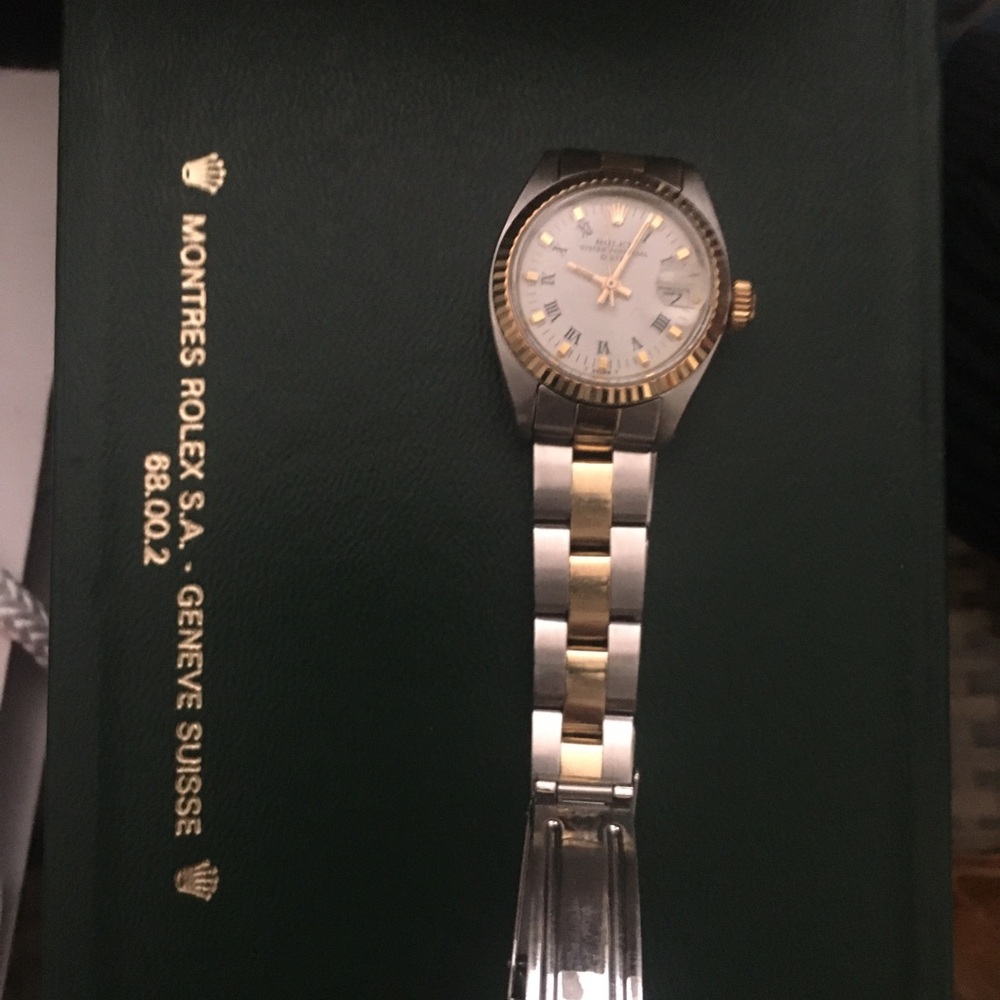 Rolex Women's Real 18K Gold Watch on stainless w/authenticity appraisal letter.